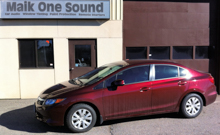 Red 2012 Honda Civic Sedan with dark privacy window tint